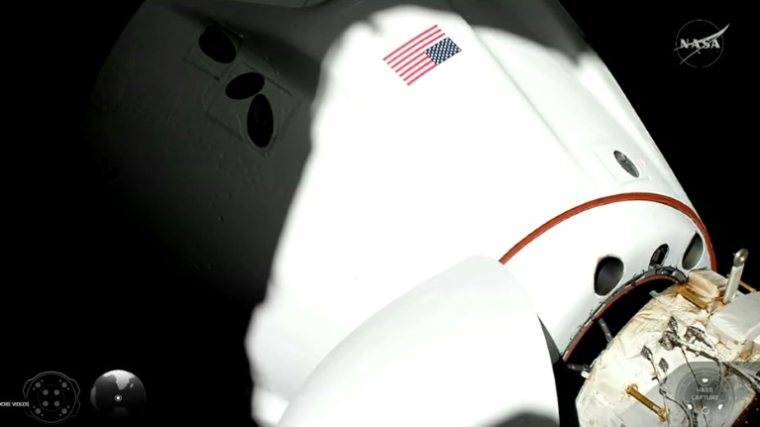 Image tirée d'une diffusion en direct de Nasa montrant l'équipage Crew-12 s'approchant de la Station spatiale internationale (ISS), le 14 février 2026 ( NASA+ / HANDOUT )