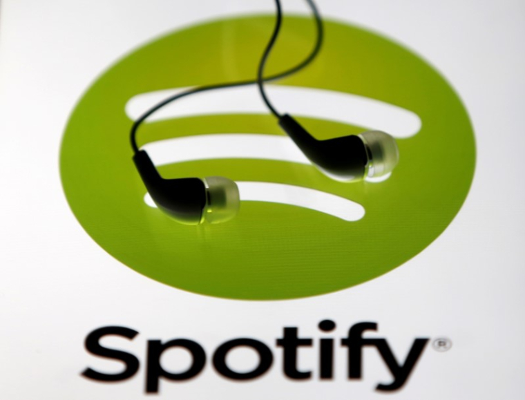 SPOTIFY ANTICIPE UNE CROISSANCE RALENTIE À 20-30% EN 2018