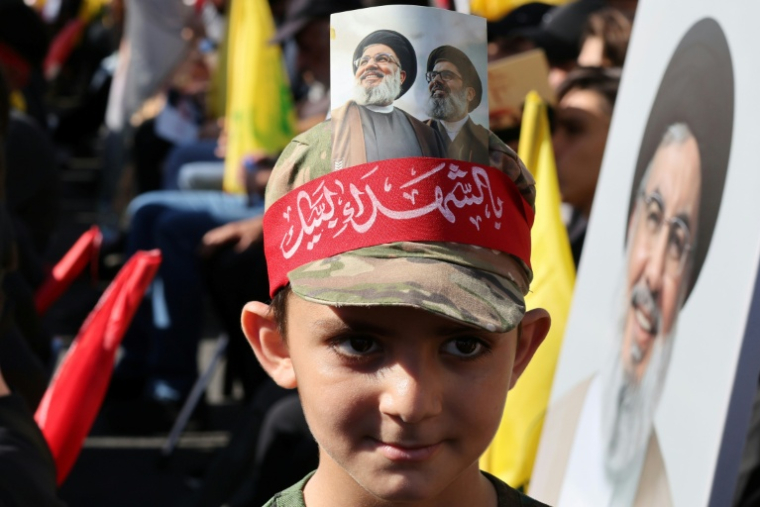 Un enfant lors de la commémoration par le Hezbollah pro-iranien de l'assassinat en 2024 par Israël de son chef, Hassan Nasrallah, dans la banlieue sud de Beyrouth le 27 septembre 2026 ( AFP / Anwar AMRO )