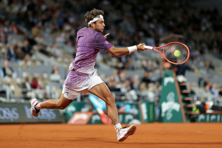 L'Italie Flavio Cobolli en quart de finale de Roland-Garros contre le Canadien Felix Auger-Aliassime le 3 juin 2026 à Paris ( AFP / Thomas SAMSON )