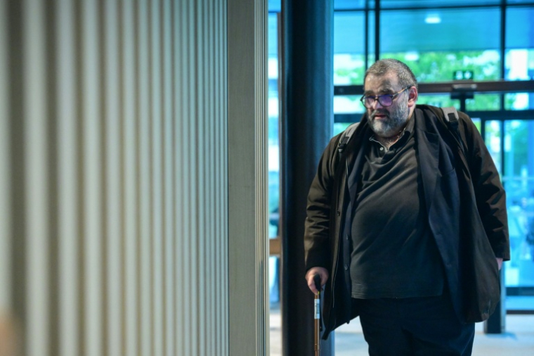 L'ancien directeur de cabinet du maire de Saint-Etienne, Pierre Gauttieri, arrive au tribunal de Lyon, le 22 septembre 2025 ( AFP / OLIVIER CHASSIGNOLE )