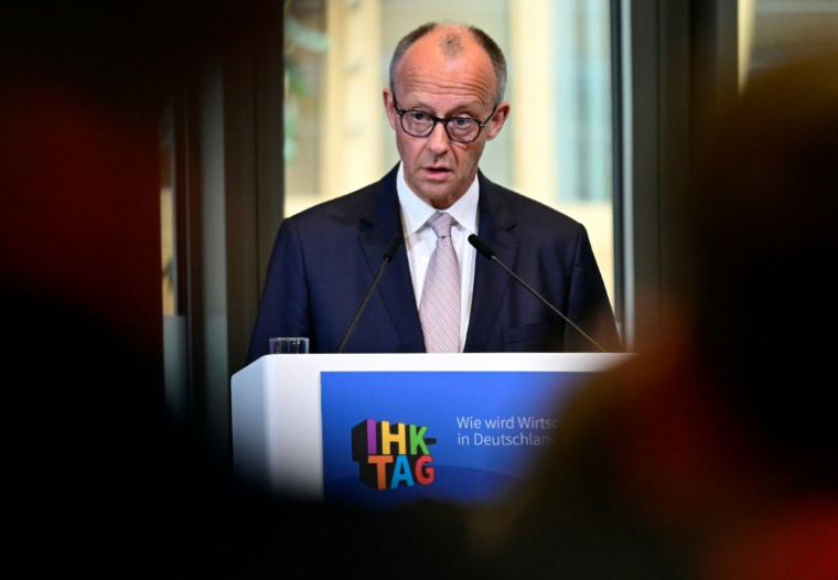 Le chancelier allemand Friedrich Merz lors d'un événement organisé par la Chambre allemande de commerce et d'industrie (DIHK) à Berlin le 7 mai à Berlin ( AFP / John MACDOUGALL )