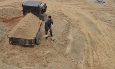 FILE PHOTO: A labourer works at a site of a rare earth metals mine at Nancheng county, Jiangxi province