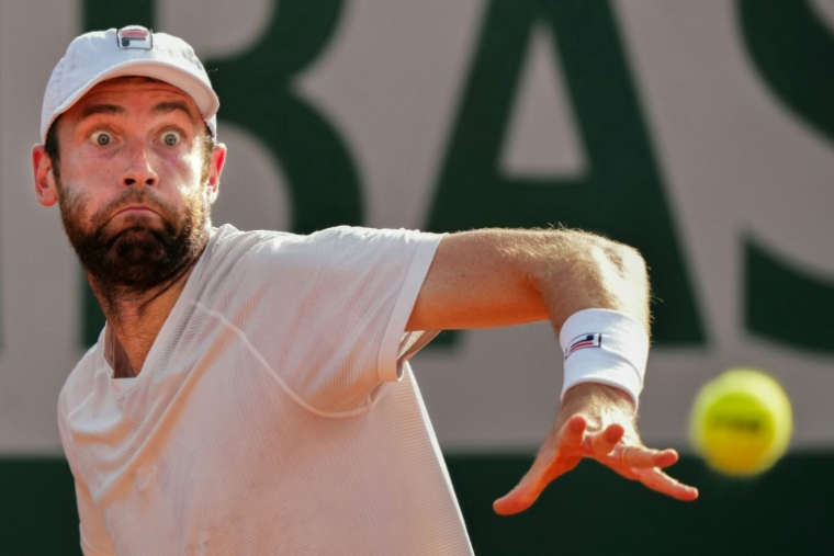 La détermination de Quentin Halys opposé à l'Italien Mattia Bellucci à Roland-Garros le 24 mai 2026  ( AFP / Dimitar DILKOFF )