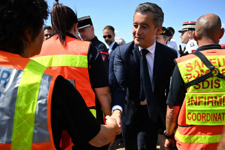 Le ministre de l'Intérieur Gerald Darmanin, le 10 août 2022 dans l'Aveyron. ( AFP / LIONEL BONAVENTURE )