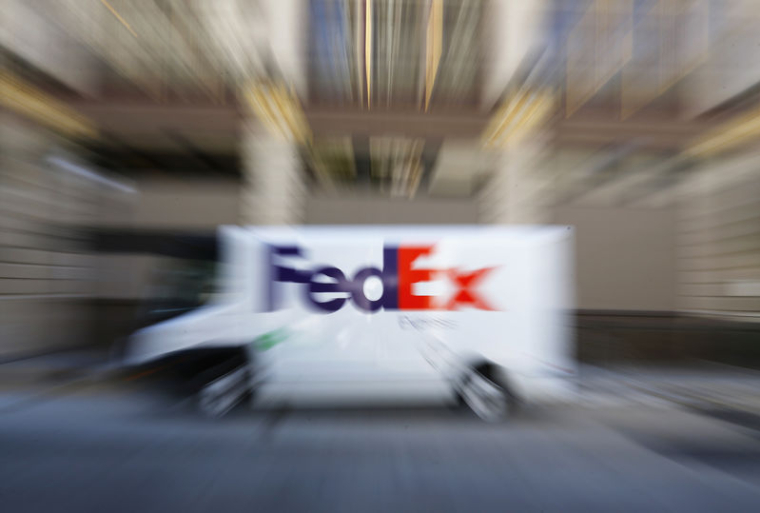 FEDEX ABAISSE ENCORE SA PRÉVISION DE BPA ANNUEL