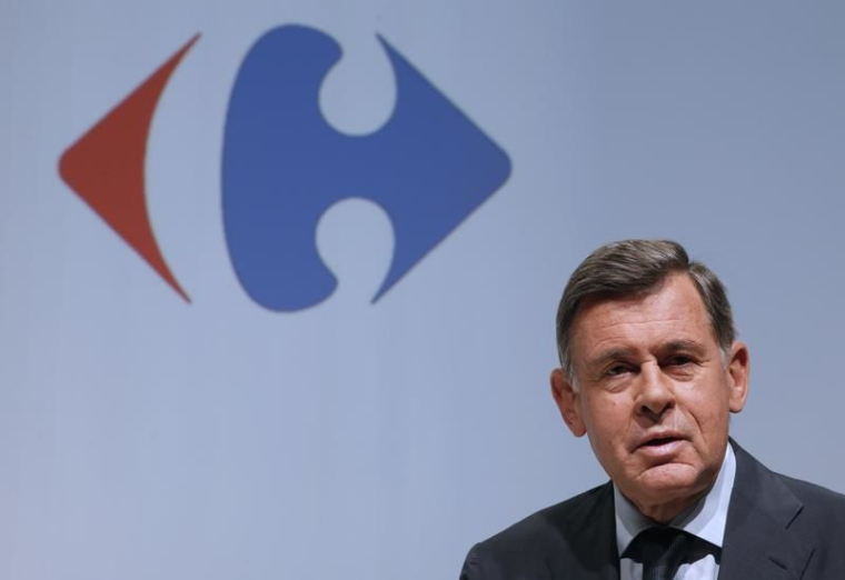 LE PDG DE CARREFOUR DÉFEND SON BILAN SOUS LES APPLAUDISSEMENTS