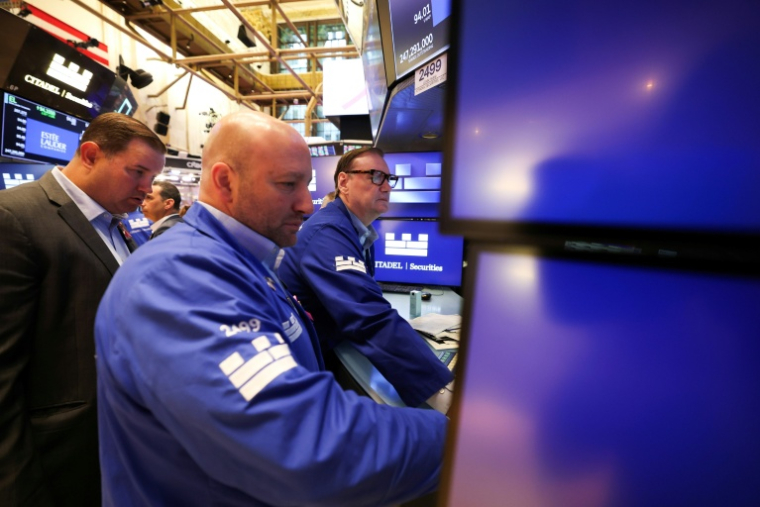 Des traders à la Bourse de New York le 5 octobre 2026 ( AFP / TIMOTHY A. CLARY )
