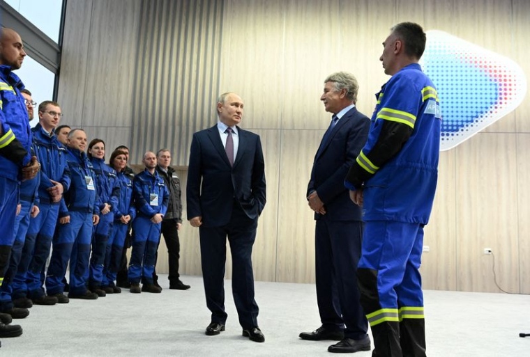 FILE PHOTO: Russian President Putin launches the first natural gas liquefaction line on a gravity-type base for the Arctic LNG-2 project in Murmansk region