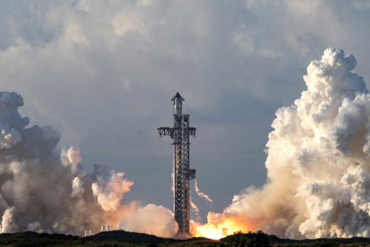 La mégafusée Starship de SpaceX décolle de la base Starbase, au Texas, lors de son 14e vol expérimental, le 28 septembre 2026 ( AFP / RONALDO SCHEMIDT )