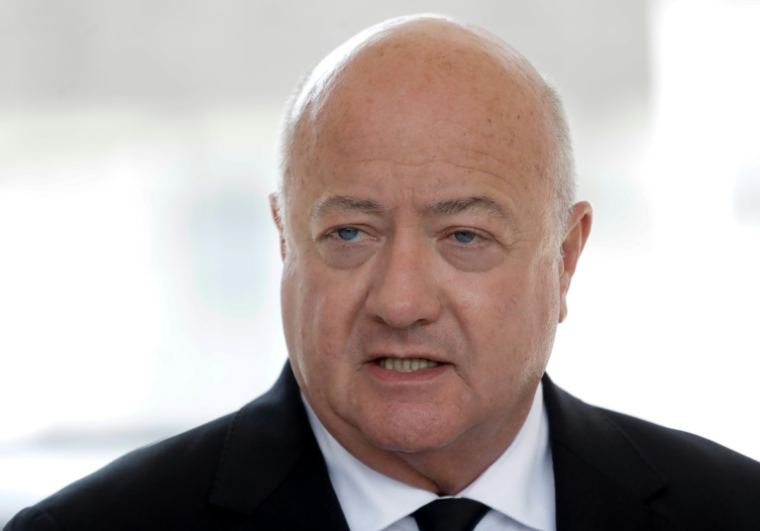 Le chancelier autrichien Christian Stocker lors d'une conférence de presse après des tirs dans un établissement scolaire qui ont fait plusieurs morts, le 10 juin 2025 à Graz, en Autriche ( AFP / Alex HALADA )