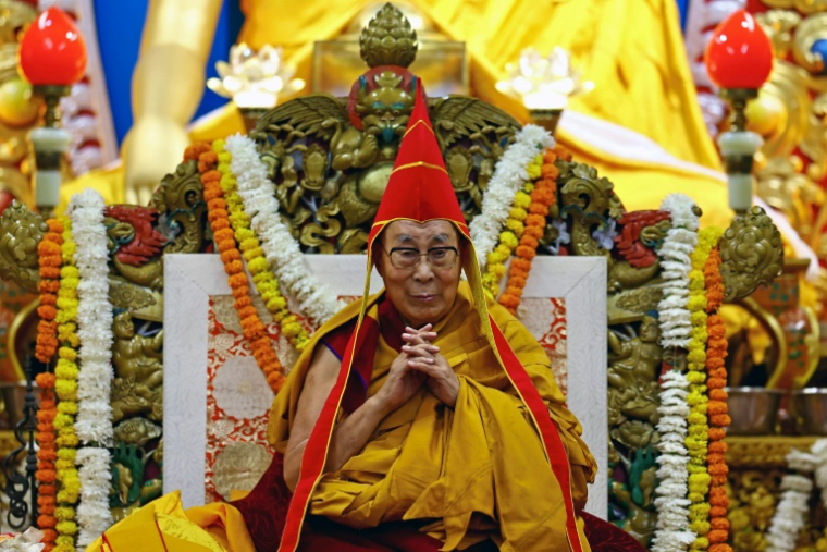 Tibetan spiritual leader the Dalai Lama attends a long-life prayer offering ceremony at the Main Tibetan Temple in McLeod Ganj, near Dharamsala on July 5, 2025. The Dalai Lama said on July 5 he dreamed of living for decades more, as the Buddhist spiritual leader prayed with thousands of exiled Tibetans on the eve of his 90th birthday. ( AFP / NIHARIKA KULKARNI )