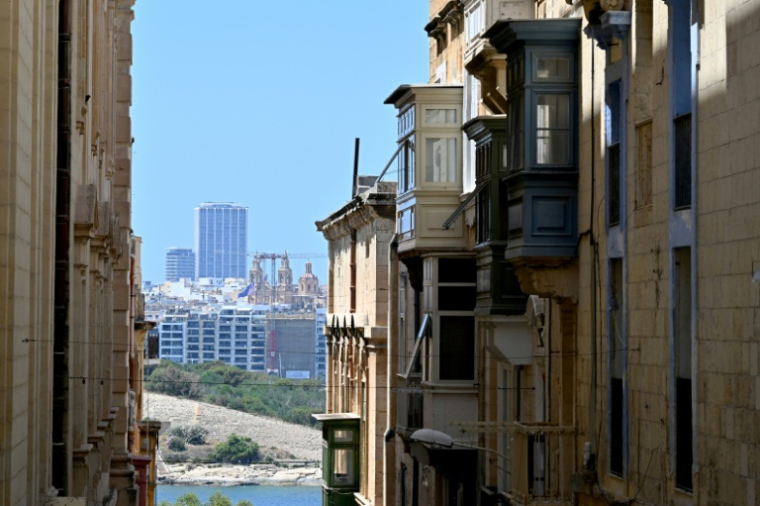The tiny Mediterranean island is the most densely populated country in Europe, and approvals for new buildings are soaring despite scandals dogging the development sector.  ( AFP / Alberto PIZZOLI )