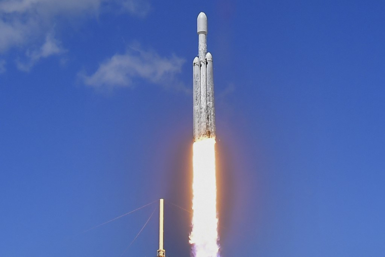 Une fusée SpaceX Falcon Heavy au décollage à Cap Canaveral (Floride), le 14 octobre 2024 ( AFP / CHANDAN KHANNA )