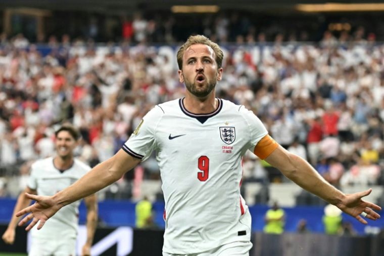 L'attaquant anglais Harry Kane  celèbre son deuxième but inscrit contre la Croatie, en phase de groupes du Mondial-2026, le 17 juin 2026 à Arlington (Texas) ( AFP / Paul ELLIS )