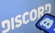 Photo d'illustration du logo de la société américaine Discord affiché sur un smartphone et un écran à Rio de Janeiro, au Brésil, le 12 août 2026 ( AFP / MAURO PIMENTEL )