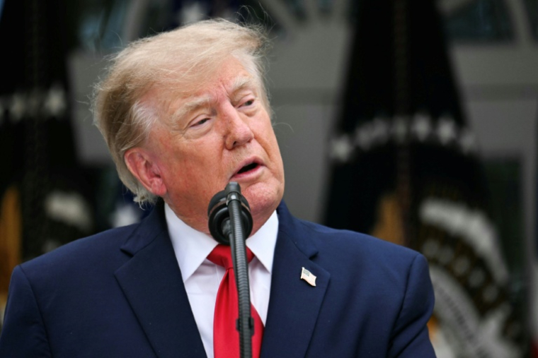 Le président américain Donald Trump à la Maison Blanche, le 15 octobre 2026 à Washington ( AFP / Jim WATSON )