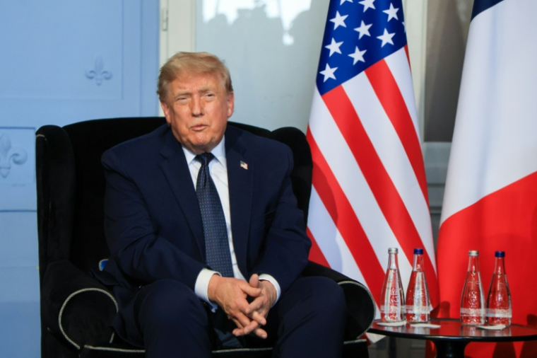 Le président américain Donald Trump à Evian pour le sommet du G7, le 15 juin 2026 en France ( POOL / Ludovic MARIN )