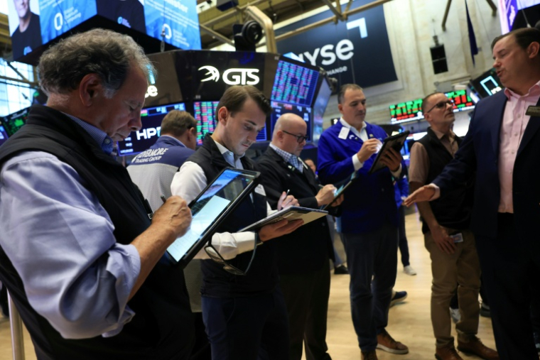Des traders à Wall Street à New York, le 16 septembre 2026 ( AFP / TIMOTHY A. CLARY )