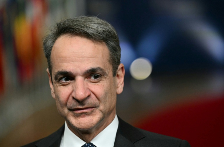 Le Premier ministre grec Kyriakos Mitsotakis à Bruxelles le 19 mars 2026 ( AFP / NICOLAS TUCAT )
