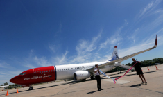 NORWEGIAN AIR SOLLICITE UNE AIDE, ESPOIR D'UNE CONSOLIDATION