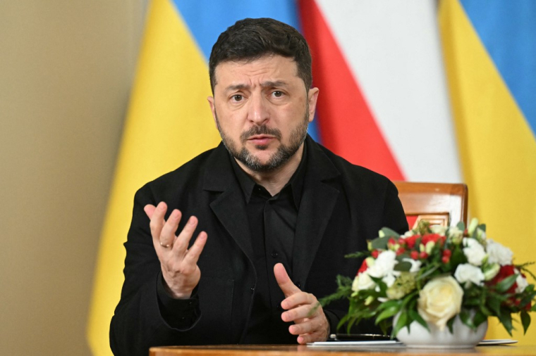 Volodymyr Zelensky à Varsovie, en Pologne, le 19 décembre 2025. ( AFP / SERGEI GAPON )