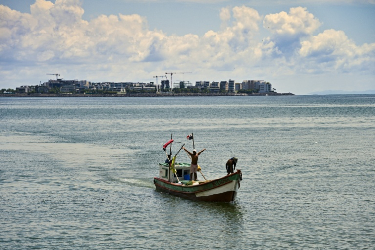 Des pêcheurs rentrent au port à Panama, le 23 septembre 2026 ( AFP / MARTIN BERNETTI )
