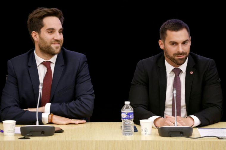 Les députés Rassemblement national (RN) Julien Odoul (g) et Thomas Ménagé, à l'assemblée nationale, le 15 septembre 2024 ( AFP / Ludovic MARIN )
