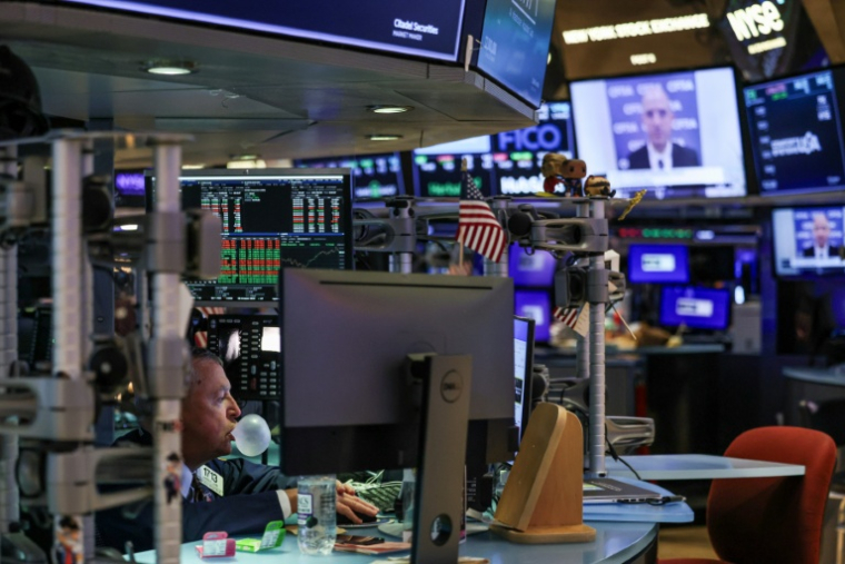 Un opérateur à la Bourse de New York le 19 novembre 2025 ( AFP / CHARLY TRIBALLEAU )