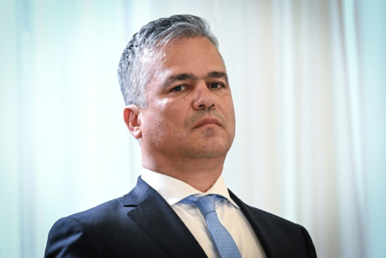 Le nouveau Premier ministre désigné de la Roumanie, Adrian Vestea, le 15 juin 2023 , à Bucarest ( AFP / Daniel MIHAILESCU )