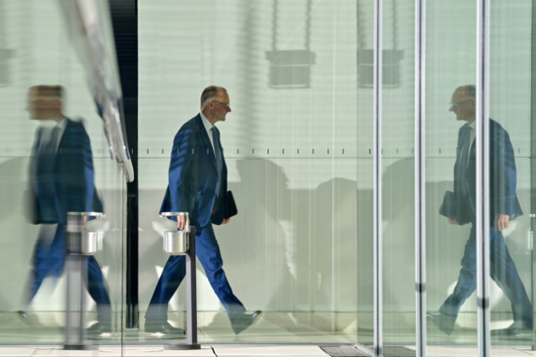 Le leader de la CDU et chancelier allemand désigné, Friedrich Merz, arrive à une réunion au Bundestag, le 17 mars 2025, à Berlin ( AFP / John MACDOUGALL )