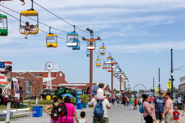 Des visiteurs sur les lieux de la foire d'Etat du Nebraska, le 4 septembre 2026 à Grand Island (Etats-Unis) ( AFP / Austin Johnson )