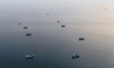 Des bateaux ancrés près du détroit d'Ormuz, au large d'Oman, le 27 juin 2026 ( AFP / - )