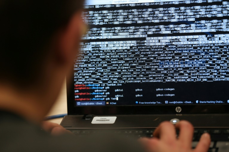 Qui a voulu la peau de LockBit, prestataire majeur de la cybercriminalité mondiale? ( AFP / THOMAS SAMSON )