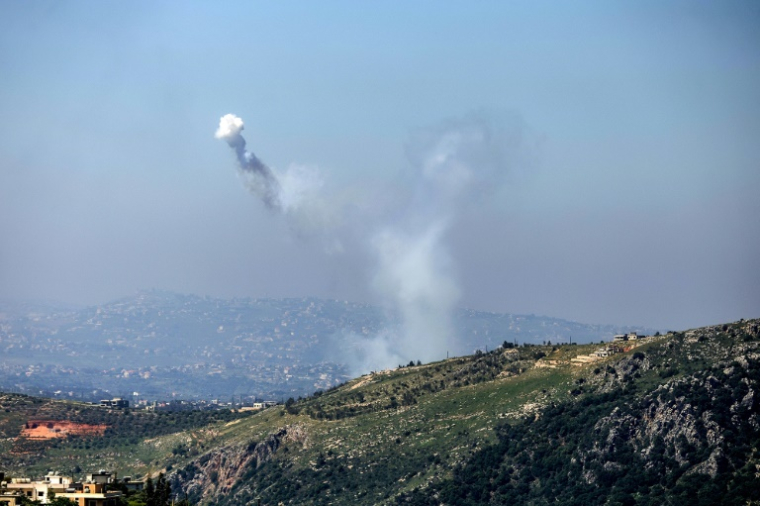 A photograph taken from the southern Lebanese area of Marjeyoun shows the smoke traces of Israeli shelling as it targets the village of Yohmor on April 30, 2026.  Lebanon's President urged Israel to fully implement a ceasefire before beginning direct talks, after Israeli strikes killed more than 20 people in the last two days. Israel has been fighting Hezbollah since early March, sending troops into south Lebanon to battle the Iran-backed militant group, with the violence ongoing despite a shaky April 17 truce. ( AFP / - )