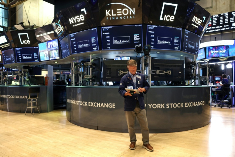 Un opérateur à la Bourse de New York, le 14 mai 2026 ( AFP / TIMOTHY A. CLARY )