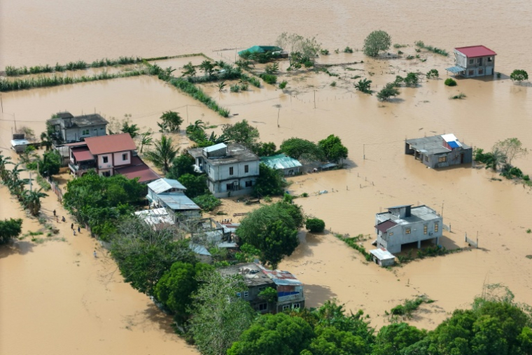 Vue aérienne des inondations à Tuguegarao, dans la province de Cagayan, au nord de Manille, en raison des fortes pluies provoquées par le super typhon Fung-won, gle 11 novembre 2025 aux Philippines ( AFP / John Dimain )