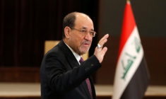 L'ancien Premier ministre irakien Nouri al-Maliki dans un bureau de vote lors des élections législatives, le 11 novembre 2025 à Bagdad ( AFP / AHMAD AL-RUBAYE )