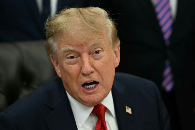 Le président américain Donald Trump dans le Bureau ovale de la Maison Blanche, le 18 septembre 2026 à Washington ( AFP / Jim WATSON )