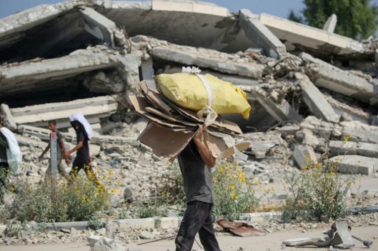 Déplacés palestiniens à Nousseirat, dans le centre de la bande de Gaza, le 26 juillet 2025 ( AFP / Eyad BABA )