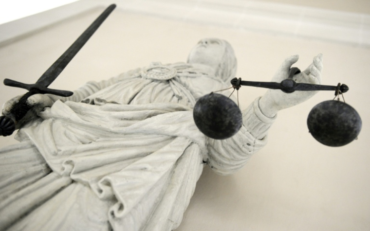 Trois personnes ont été mises en examen et écrouées à Paris dans le cadre d'une double affaire d'espionnage économique au profit de Moscou et d'ingérence ( AFP / Damien MEYER )