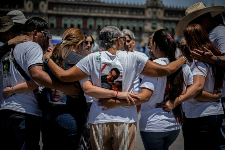 Manifestation sur les migrants portés disparus, à Mexico, le 14 mai 2026 ( AFP / CARL DE SOUZA )