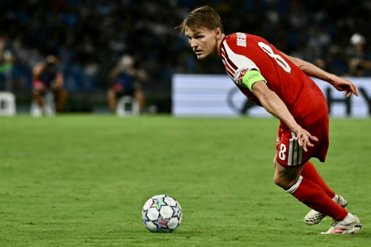 Le Norvégien Martin Odegaard a offert la victoire à Arsenal contre Naples en Ligue des champions le 9 septembre 2026 à Naples ( AFP / Filippo MONTEFORTE )