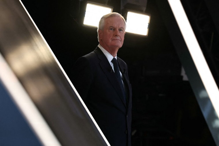 Michel Barnier à Aubervilliers, le 3 octobre 2024. ( AFP / THOMAS SAMSON )
