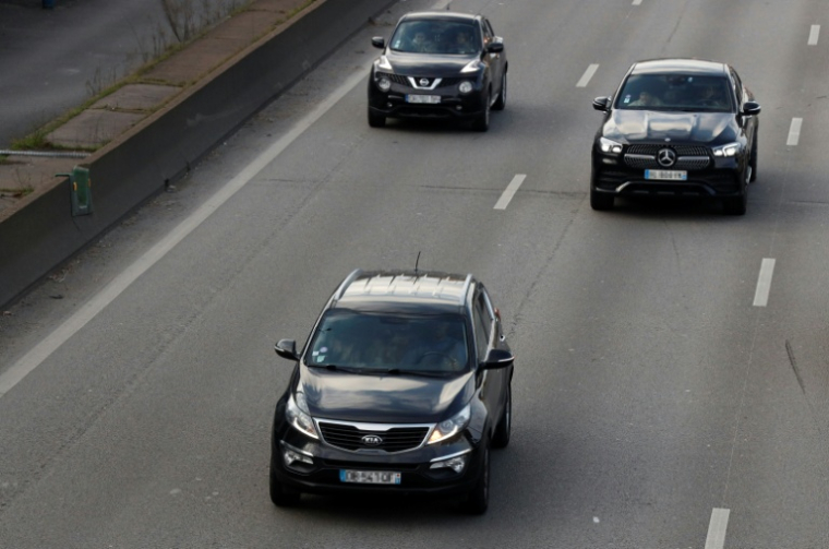 Des SUV sur le boulevard périphérique à Paris, le 31 janvier 2024 ( AFP / Nancy Wangue MOUSSISSA )