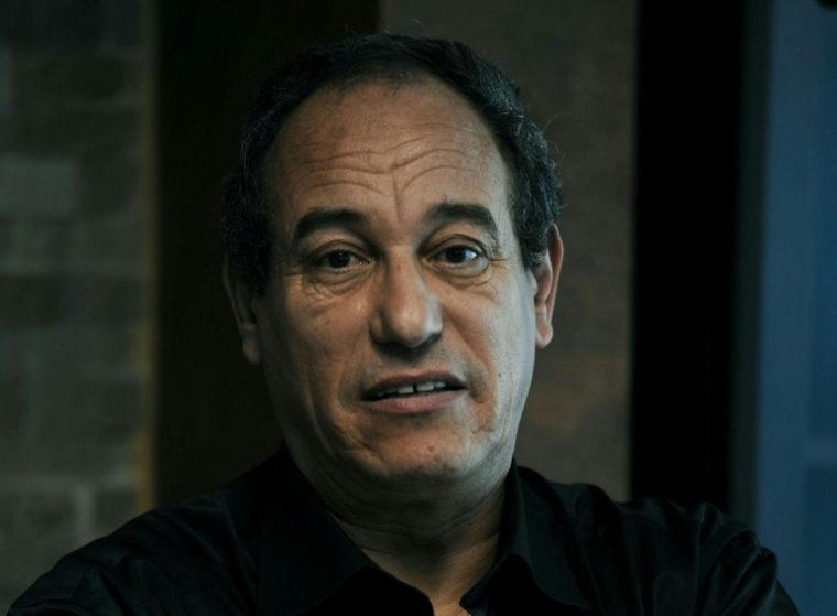 L'opposant algérien Hichem Aboud pose à Alger le 19 mai 2013 ( AFP / FAROUK BATICHE )