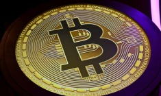 Trois hommes ont été condamnés à Vesoul à des peines de 25 et 30 ans de réclusion pour avoir assassiné un étudiant de 19 ans pour s'approprier ses bitcoins ( AFP / Giuseppe CACACE )