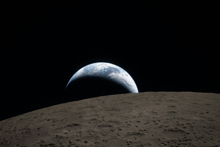 Photographie d'un coucher de Terre prise par l'équipage d'Artémis II et publiée par la Nasa le 7 avril 2026 ( NASA / Handout )