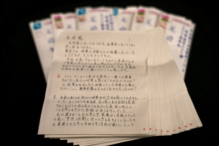 Lettres enovoyées à l'AFP par le criminel japonais Takanori Kuzuoka depuis sa prison dans le nord du Japon, le 5 novembre 2025 ( AFP / Kazuhiro NOGI )