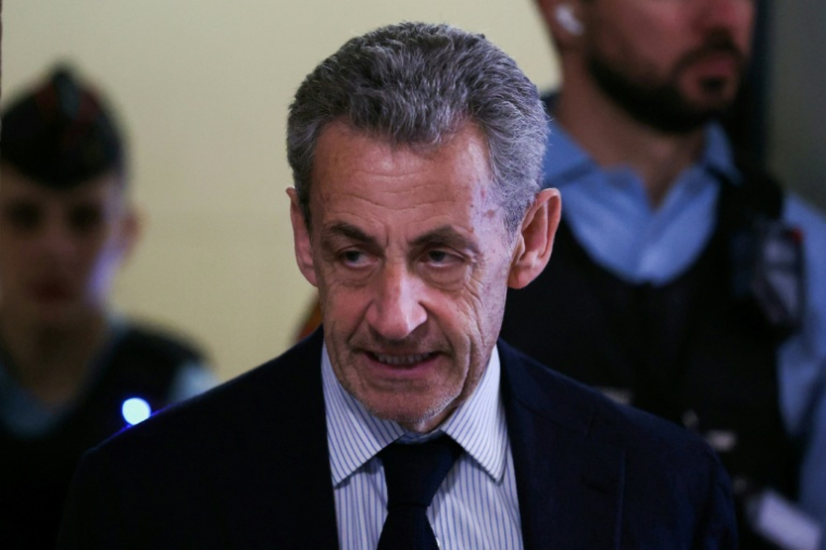 L'ex-président français Nicolas Sarkozy à son procès en appel dans l'affaire du financement libyen le 23 mars 2026 à Paris ( AFP / Alain JOCARD )